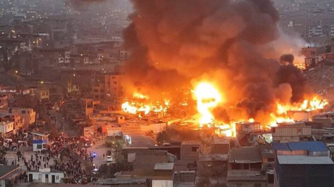 Drone Footage Shows Massive Blaze Sweeping Through Homes In Peru